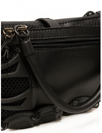 Innerraum black shoulder bag in leather, rubber and mesh bags price