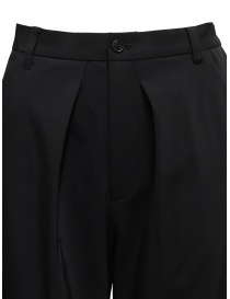 Zucca pantalone nero lucido con le pince prezzo